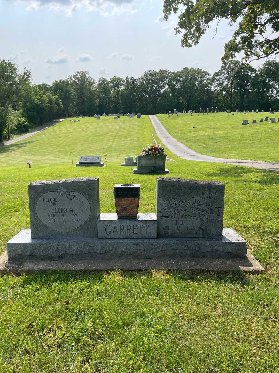 Helen M. Garrett's grave. Photo 1