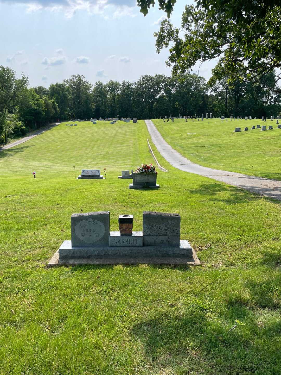 Helen M. Garrett's grave. Photo 3